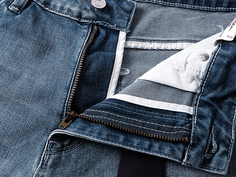 R+A Light Blue Paint-Splatter Patchwork Jeans — detail